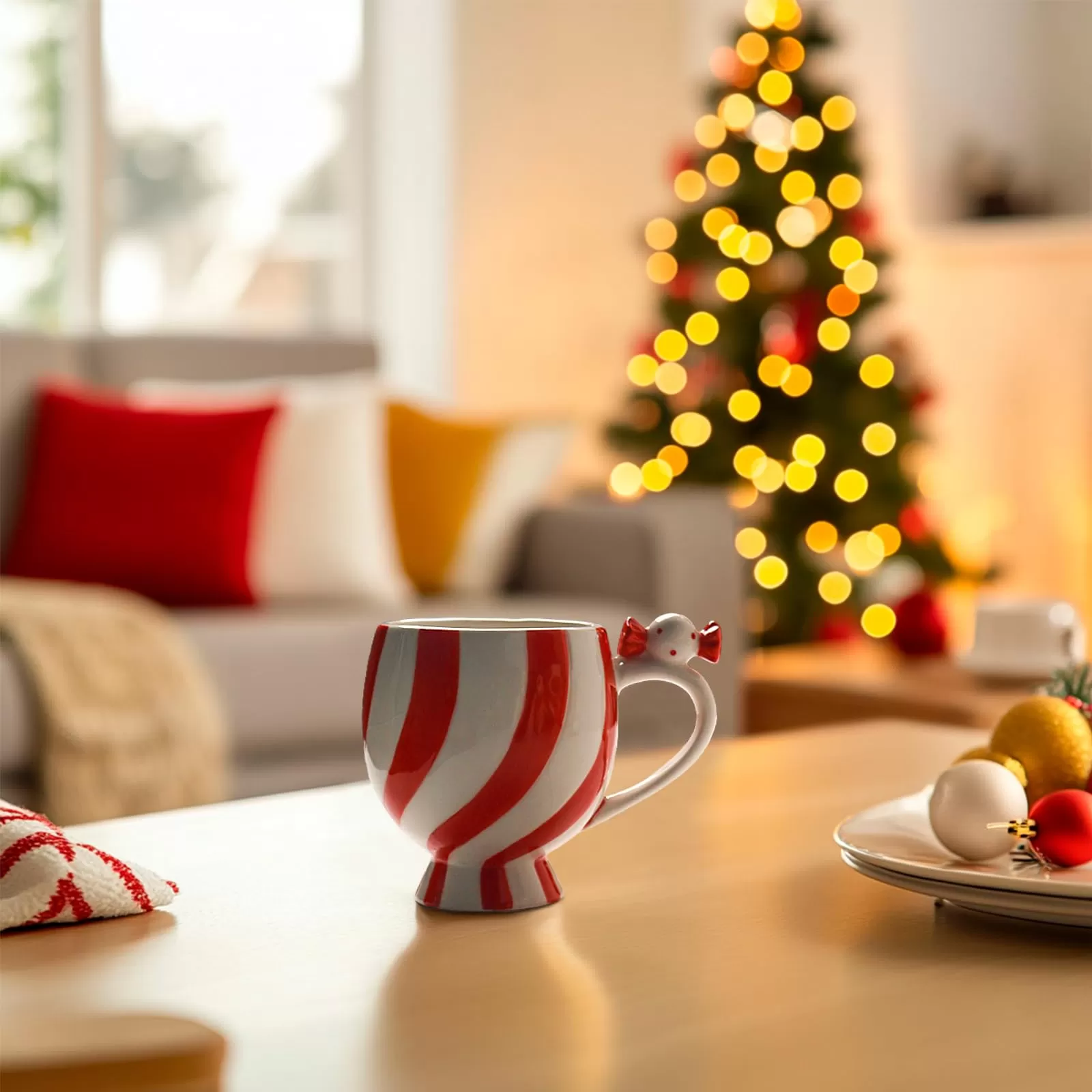 Holiday ceramic mugs with bow design
